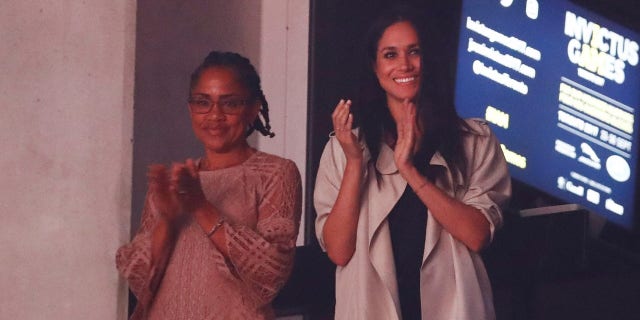 Some speculate Doria Ragland will walk Meghan Markle down the aisle on Saturday after Markle's father said he won't be attending the wedding.