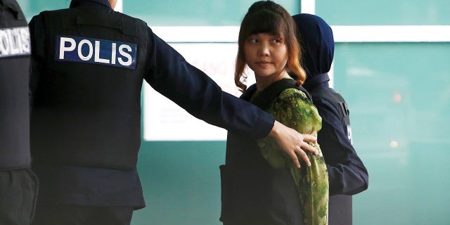 Doan Thi Huong, accused of killing Kim Jong Nam, arrives at Kuala Lumpar airport.