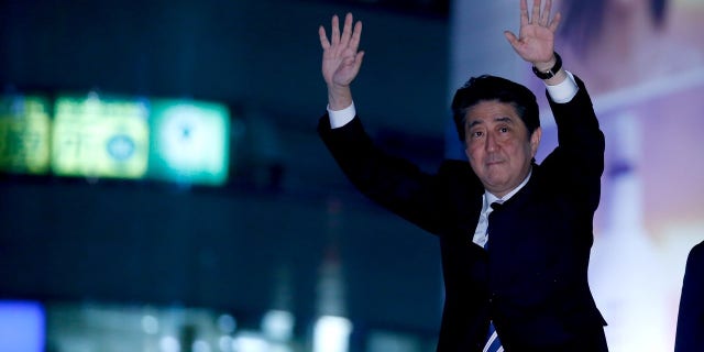 Shinzo Abe, who is also the ruling Liberal Democratic Party leader, attends an election campaign rally in Tokyo.