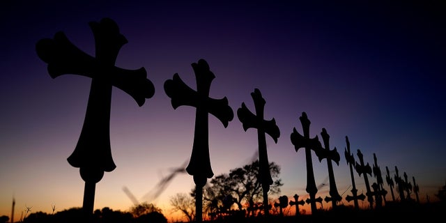 Crosses are placed near a vigil in the memory of those killed in the shooting at the First Baptist Church of Sutherland, Texas, U.S., November 6, 2017. REUTERS/Rick Wilking - RC1B04F17A80
