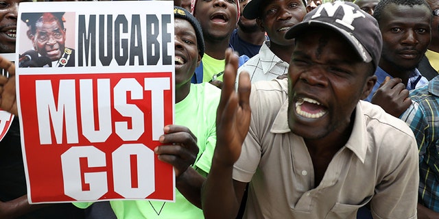 Cars began honking horns and people cheered in the streets, as the news spread like wildfire across the capital, Harare.