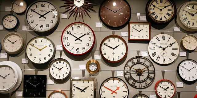 Clocks are displayed inside the new John Lewis store at the Westfield shopping centre in White City, London, Britain, March 19, 2018.