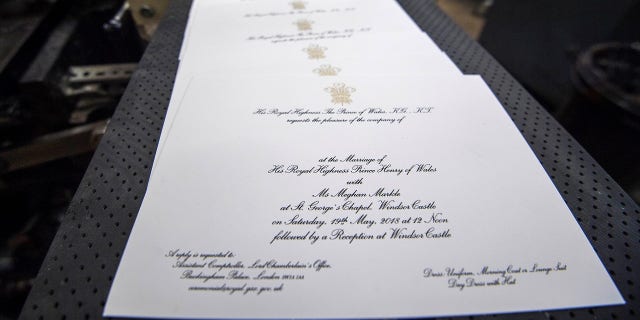 The wedding invitation was designed by Barnard & Westwood.