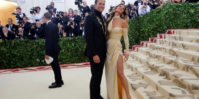 Tom Brady and Gisele Bundchen wore Versace to the Met Gala.