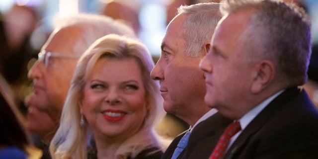 U.S. Deputy Secretary of State John Sullivan, Israeli Prime Minister Benjamin Netanyahu and his wife Sara Netanyahu sit during a reception held at the Israeli Ministry of Foreign Affairs in Jerusalem, ahead of the moving of the U.S. embassy to Jerusalem.