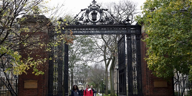 Students walk on campus of Yale University in New Haven, Connecticut.