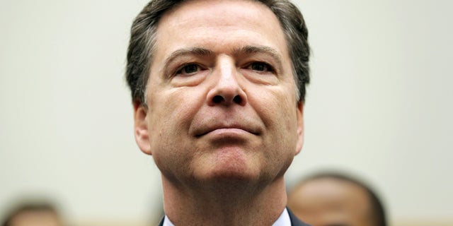 FBI Director James Comey arrives for a House Judiciary hearing on "The Encryption Tightrope: Balancing Americans' Security and Privacy" on Capitol Hill in Washington March 1, 2016. REUTERS/Joshua Roberts TPX IMAGES OF THE DAY - GF10000329625