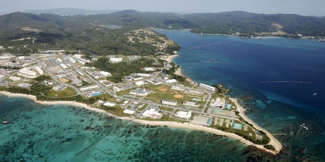 FILE -- Coral reefs are seen along the coast near the U.S. Marine base Camp Schwab, off the tiny hamlet of Henoko in Nago, on the southern Japanese island of Okinawa, in this file aerial photo taken by Kyodo Oct. 29, 2015, file photo.