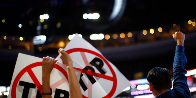 Delegates rally against the Trans-Pacific Partnership trade deal at the Democratic National Convention in 2016.
