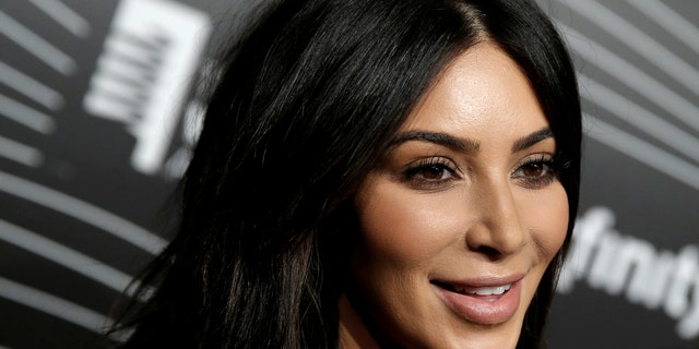 Kim Kardashian West participates in a television interview as she arrives for the 20th Annual Webby Awards in Manhattan, New York, U.S., May 16, 2016. REUTERS/Mike Segar/File Photo - RTSRT2M