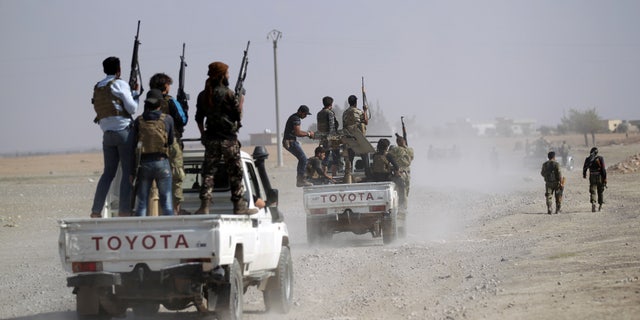 Rebel fighters near Azaz last October.
