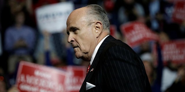 Former New York City Mayor Rudy Giuliani appears before Republican U.S. presidential nominee Donald Trump at a campaign rally in Cincinnati, Ohio, U.S., October 13, 2016. REUTERS/Mike Segar - RTSS6AZ