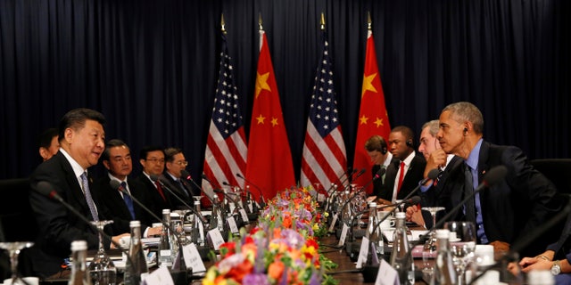President Barack Obama meets with Chinese President Xi Jinping in Lima, Peru, on Saturday.