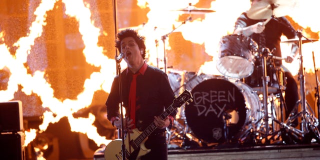 Green Day performs "Bang Bang" at the 2016 American Music Awards in Los Angeles, California, U.S., November 20, 2016.