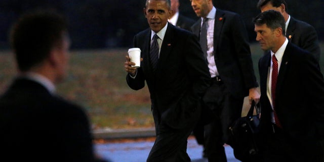 Former President Barack Obama appointed Ronny Jackson (right) to position of physician to the president.
