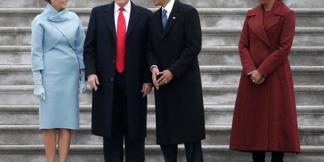 Former president Barack Obama (2nd R) and then-President Donald Trump share a laugh as former First Lady Michelle Obama (R) and Melania Trump look on following inauguration ceremonies swearing in Trump as the 45th president of the United States on the West front of the US Capitol in Washington, US, January 20, 2017. REUTERS/Mike Segar - RTSWJBX