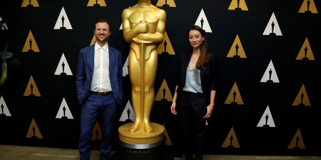 Director Orlando von Einsiedel and producer Joanna Natasegara of "The White Helmets," Academy Award nominee for Documentary (Short Subject), pose at a reception at the Academy of Motion Picture Arts and Sciences in Beverly Hills, California U.S., February 22, 2017.