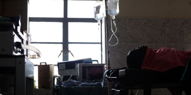 A woman rests after undergoing an obstetric fistula operation at the Juba Teaching Hospital in South Sudan, November 8, 2013. According to a Ministry of Health official, it is estimated that there are around 60,000 women with fistula, which are serious injuries caused by childbirth and a major cause of maternal mortality, in South Sudan. A Fistula Eradication campaign, which started on November 3 and