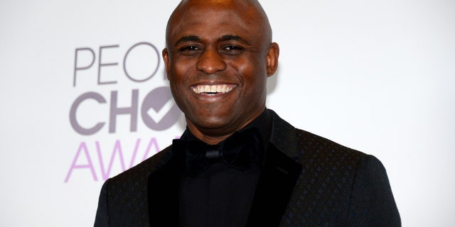 Wayne Brady poses backstage at the 2014 People's Choice Awards in Los Angeles, California January 8, 2014.