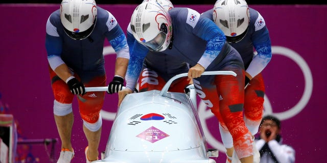 The South Korean bobsled team prepares for a race.