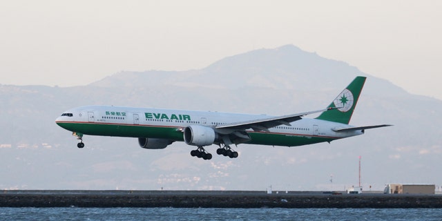 An Eva Air Boeing 777-300ER, with Tail Number B-16711, lands at San Francisco International Airport, San Francisco, California, April 11, 2015. REUTERS/Louis Nastro - RTX19W22