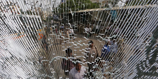The days of broken windows might just be over, thanks to a team of researchers that have developed glass they say is as strong a steel. ( REUTERS/Amit Dave)