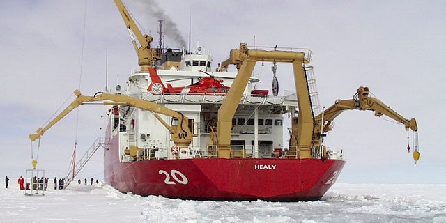 U.S. Coast Guard Polar Icebreaker/Research Vessel Healy, (WAGB 20) named after Captain Michael A. Healy, most notable as the foremost seaman and navigator of his time in the Bering Sea and Alaskan Arctic regions while Commanding Officer of the U. S. Revenue Cutter BEAR from 1886 to 1895, is pictured breaking ice in this November 30, 1999 photo. President Barack Obama on September 1, 2015 proposed a faster timetable for buying a new heavy icebreaker for the U.S. Arctic, where quickly melting sea ice has spurred more maritime traffic, and the United States has fallen far behind Russian resources. REUTERS/U.S. Coast Guard/Handout FOR EDITORIAL USE ONLY. NOT FOR SALE FOR MARKETING OR ADVERTISING CAMPAIGNS. THIS IMAGE HAS BEEN SUPPLIED BY A THIRD PARTY. IT IS DISTRIBUTED, EXACTLY AS RECEIVED BY REUTERS, AS A SERVICE TO CLIENTS - RTX1QN8N