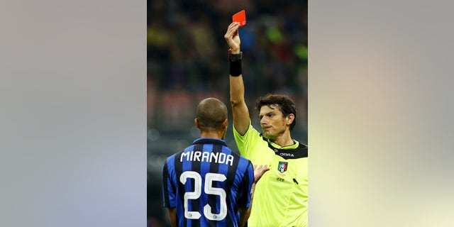 Referee shows a player a red card. (Reuters)