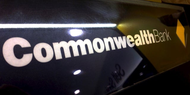 A Commonwealth Bank of Australia logo adorns the wall of a branch located in Sydney, Australia, November 5, 2015. The Commonwealth Bank of Australia (CBA), the country's No.2 lender by assets, on Thursday posted first quarter unaudited cash earnings of A$2.4 billion ($1.7 billion) while bad debt charges fell. Australia's four major banks - CBA, National Australia Bank, ANZ Banking Corp and Westpac - posted their sixth straight year of record profits but are preparing for their slowest earnings growth since the global financial crisis as the economy cools and stricter capital regulations bite. REUTERS/David Gray - RTX1UT17