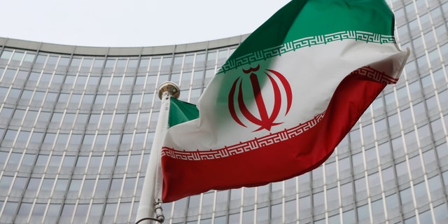 Jan. 15, 2016: An Iranian flag flutters in front of the International Atomic Energy Agency headquarters in Vienna, Austria. (REUTERS)
