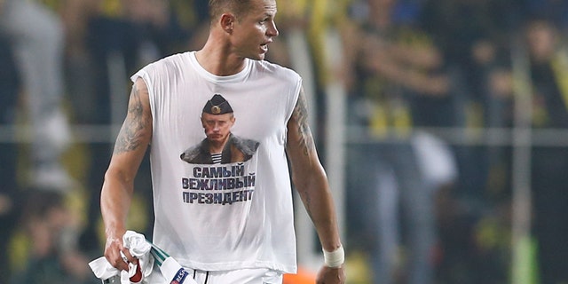 Feb. 16, 2016: Lokomotiv Moscow's Dmitri Tarasov wearing a t-shirt depicting Russian President Vladimir Putin. (Reuters)