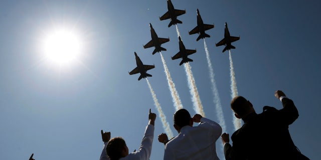 The Blue Angels perform a fly-over at the start of the graduation and commissioning ceremony at the U.S. Naval Academy in Annapolis, Maryland, May 27.