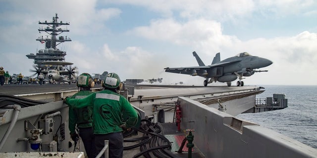 FILE -- A U.S. Navy F/A-18E Super Hornet launches from the flight deck of the aircraft carrier USS Dwight D. Eisenhower (CVN 69) in the Mediterranean Sea June 28, 2016.