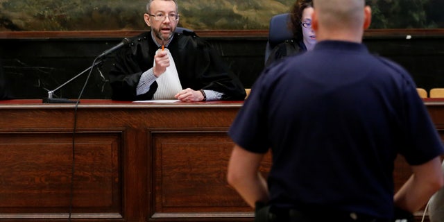 Belgian judge Pierre Hendrickx presides over the trial of suspects in the foiled Islamist attack plot in the town of Verviers.