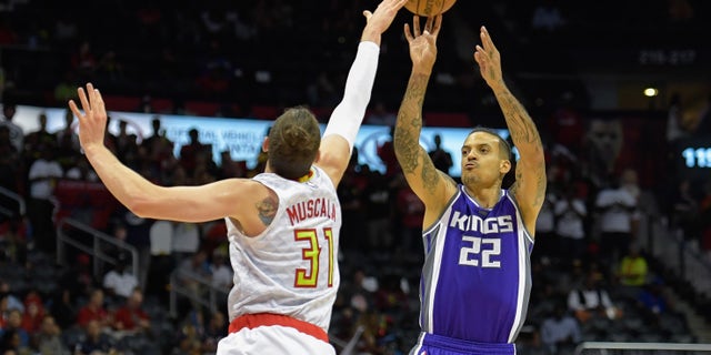 Sacramento Kings forward Matt Barnes (22) shoots over Atlanta Hawks forward Mike Muscala (31) during a game in October.