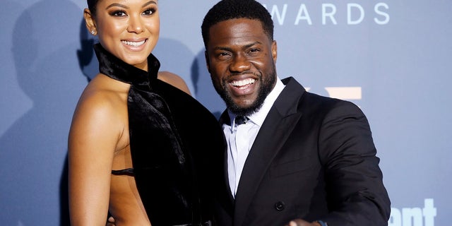 Actor Kevin Hart and wife Eniko Parrish arrive at the 22nd Annual Critics' Choice Awards in Santa Monica, California, U.S., December 11, 2016. REUTERS/Danny Moloshok - HT1ECCC05857M
