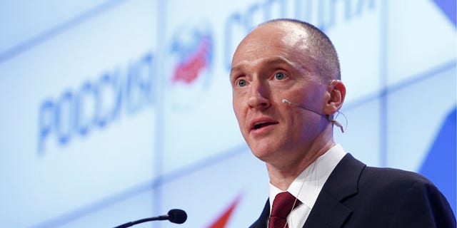 One-time advisor to President Trump Carter Page addresses the audience during a presentation in Moscow, Russia, December 12, 2016. REUTERS/Sergei Karpukhin - RC165B503FF0