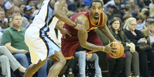 Dec 14, 2016; Memphis, TN, USA; Cleveland Cavaliers guard J.R. Smith (5) holds the ball as Memphis Grizzlies guard Tony Allen (9) defends at FedExForum. Memphis defeated Cleveland 93-85. Mandatory Credit: Nelson Chenault-USA TODAY Sports