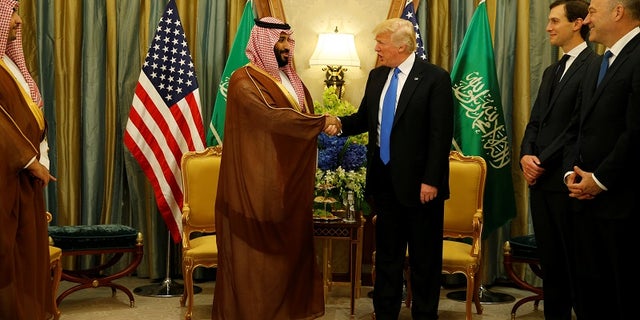 FILE -- President Donald Trump meets with Saudi Arabia's Deputy Crown Prince and Minister of Defense Mohammed bin Salman (center L) at the Ritz Carlton Hotel in Riyadh, Saudi Arabia May 20, 2017.