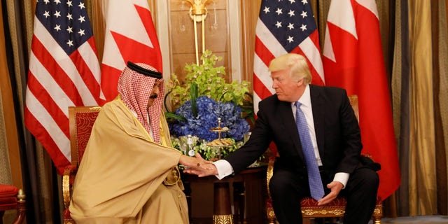FILE - President Donald Trump meets with King Hamad bin Isa Al Khalifa of Bahrain in Riyadh, Saudi Arabia, May 21, 2017.