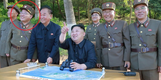 Kim Jong Sik is circled in red in this photo. He is the scientist behind many of the country's missile successes.