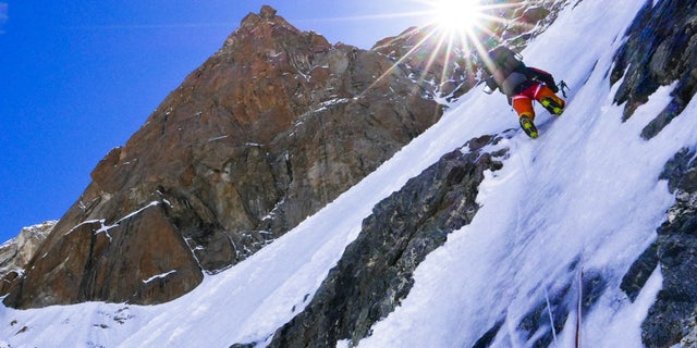 Climbers head toward Camp 2 on the Kinshofer route the day the photographer reviewed the last SMS from Alberto Zerain while climbing Nanga Parbat, Pakistan June 24, 2017.