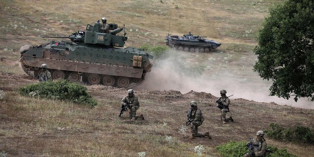 U.S. army soldiers take part in "Peace Sentinel 2017," a joint military drill together with Serbian and Bulgarian soldiers at Koren military training ground, Bulgaria, July 15, 2017.