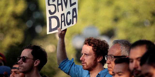 Supporters of the Deferred Action for Childhood Arrivals program rally on Olivera Street in Los Angeles, Calif., Sept. 5, 2017. (REUTERS/ Kyle Grillot )