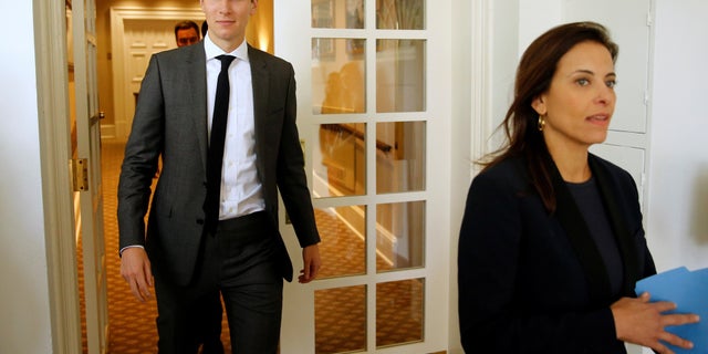 White House senior advisor Jared Kushner and U.S. Deputy National Security Advisor for Strategy Dina Powell walk out to attend a joint statement by U.S. President Donald Trump and Singapore’s Prime Minister Lee Hsien Loong in the Rose Garden.