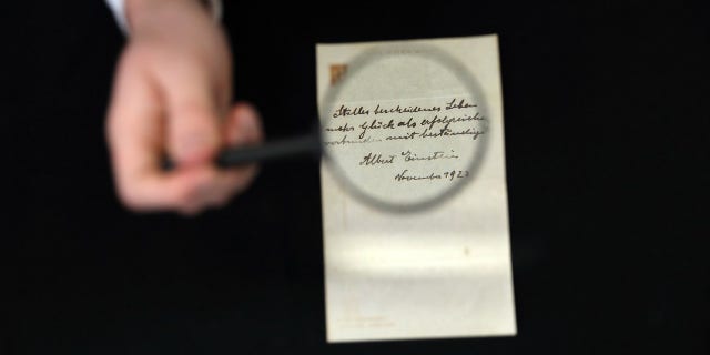 "A calm and modest life brings more happiness than the pursuit of success combined with constant restlessness," the note reads in German.