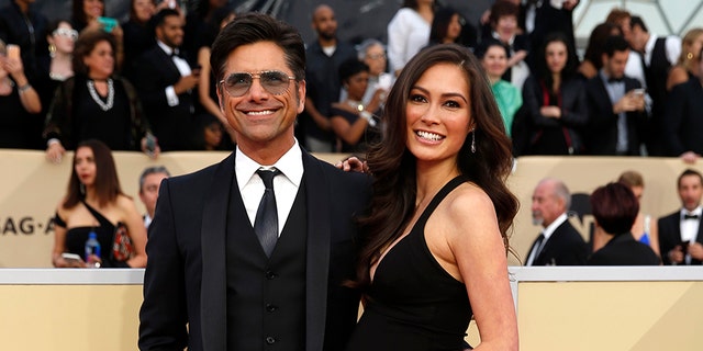 John Stamos and Caitlin McHugh announced in December that they were expecting a baby.