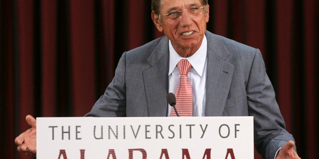 Former NFL quarterback Joe Namath talks with reporters at the University of Alabama in Tuscaloosa, Alabama. Namath, who led the New York Giants to their only Super Bowl win and was named the game's MVP in 1969, graduated from the university in 2007.