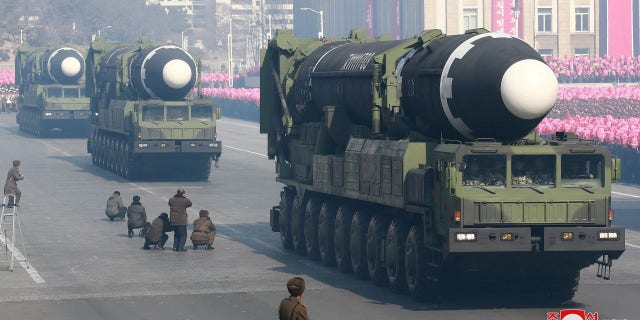North Korea shows off its missiles in a parade.