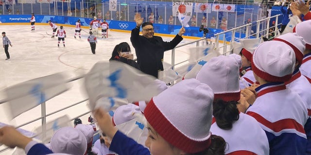 A Kim Jong Un impersonator danced and cheered with the North Korean cheer squad on Wednesday.